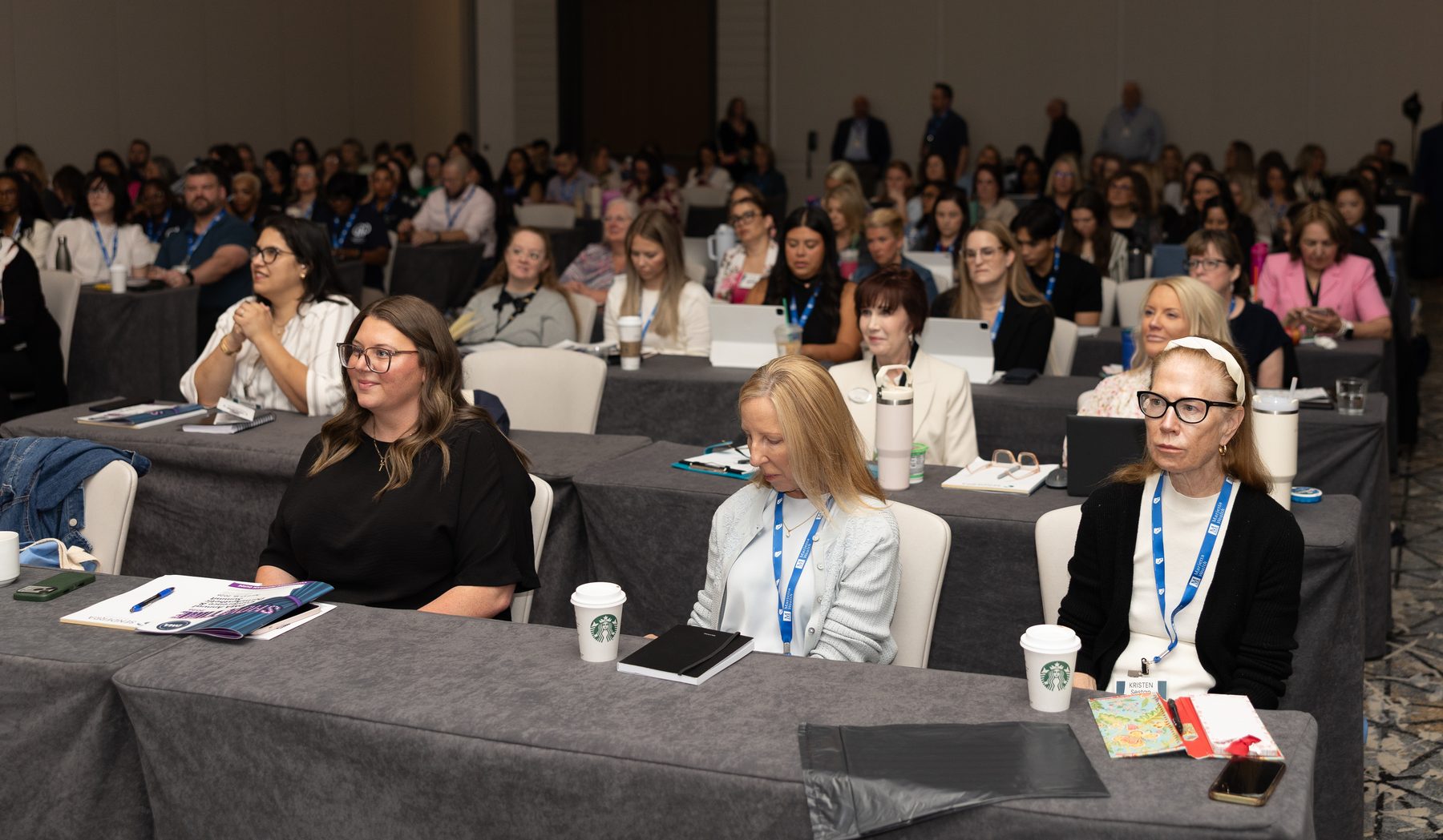 A full room of practice managers in a session at the DMA Annual Conference